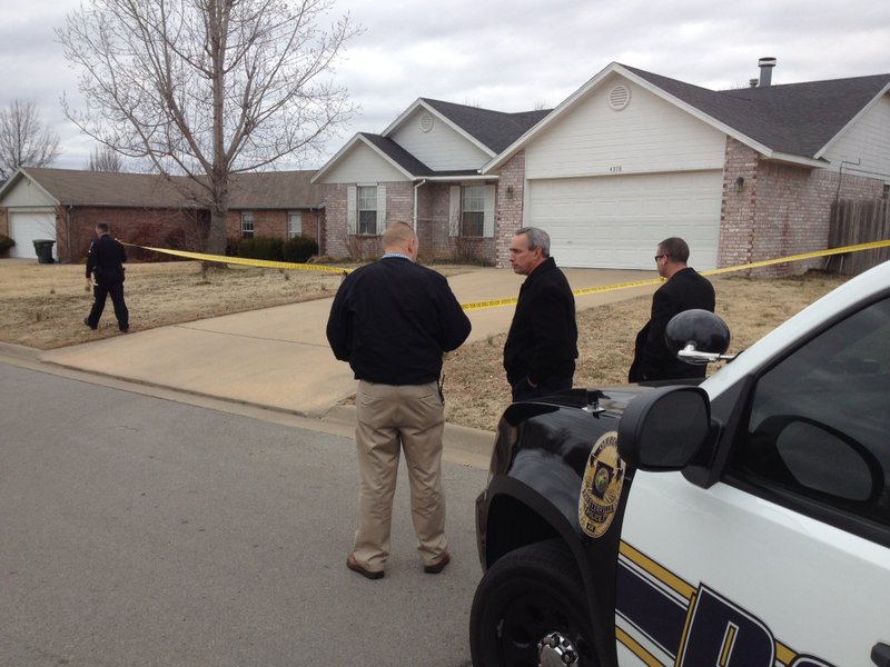 Authorities at the scene of a reported home invasion Monday at 4378 Chaparral Lane in Fayetteville.