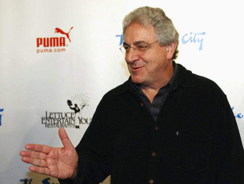 In this Dec. 12, 2009, file photo, actor and director Harold Ramis walks the Red Carpet as he arrives to celebrate The Second City's 50th anniversary in Chicago. An attorney for Ramis said the actor died Monday morning, Feb. 24, 2014, from complications of autoimmune inflammatory disease. He was 69. 