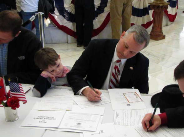 U.S. Rep. Tim Griffin's 3-year-old son look son as his father files Monday to run for lieutenant governor.