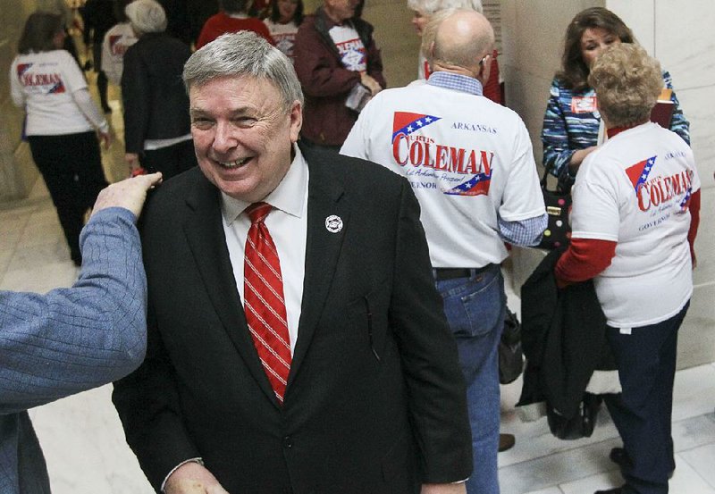 Arkansas Democrat-Gazette/BENJAMIN KRAIN --2/24/2014--
Curtis Coleman is surrounded by supporters at the state Capitol as he files to run for Republican gubernatorial candidate during the first day of a filing period for candidates in this year's elections.