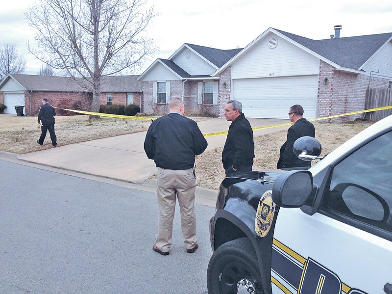 STAFF PHOTO DAVID GOTTSCHALK 
Fayetteville police investigate a shooting Monday at 4378 Chaparral Lane in Fayetteville.