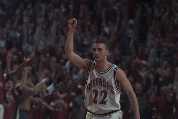 Arkansas guard Pat Bradley reacts after breaking the record for most career 3-pointers by a Southeastern Conference player during a game against No. 2 Auburn at Bud Walton Arena on Feb. 24, 1999. (ADG File/William Thompson)