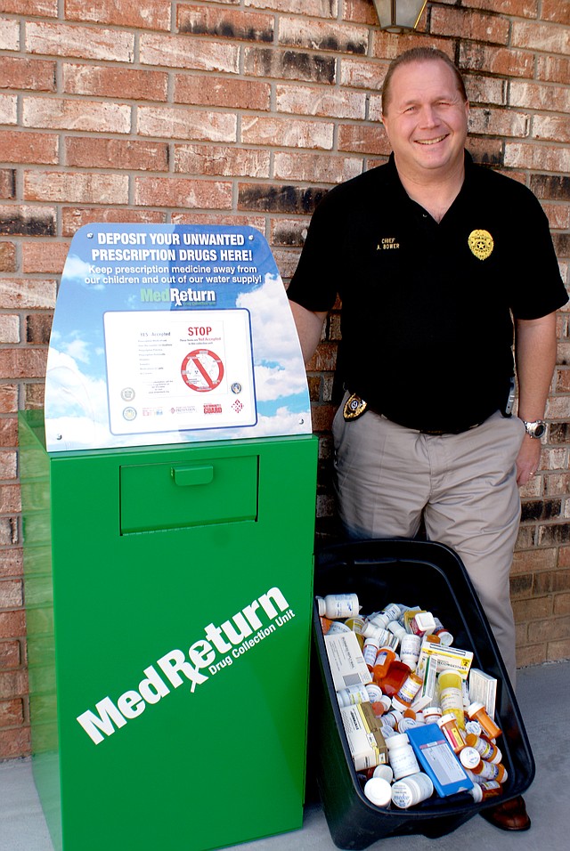 Photo by Dodie Evans Police Chief Andrew Bower with newly installed drug collection unit