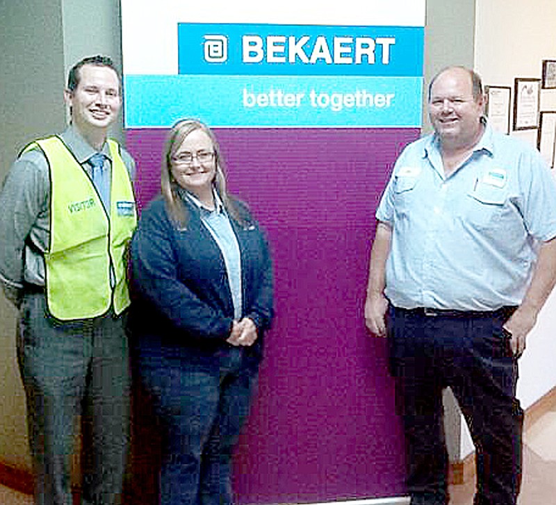 Photograph submitted Charley Clark, director, met with Bakeart employees Kathy Wiltse, human resources manager, and Billy Clark Jr. (far right) to discuss Beakeart's needs for future employees'; education. Clark said business will tell academy officials what employees need to know.