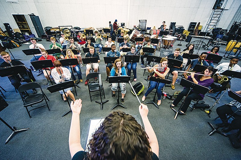 Carrie Pawelski directs the Henderson State University Wind Ensemble during practice of De Falla’s “Ritual Fire Dance.”