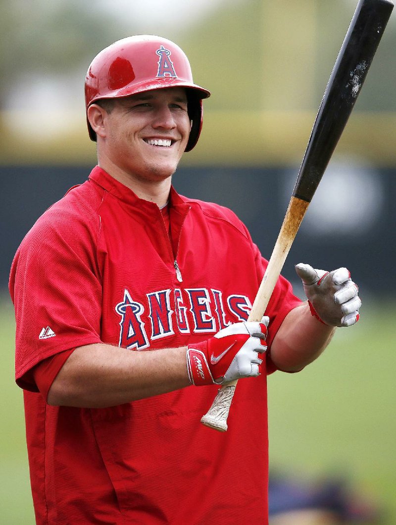 Former Arkansas Traveler Mike Trout agreed to a $1 million, one year contract with the Los Angeles Angels on Wednesday. Trout, 22, will become eligible for arbitration after the 2014 season. The All-Star outfielder batted .323 with 27 home runs, 97 RBI and 33 stolen bases last season. 