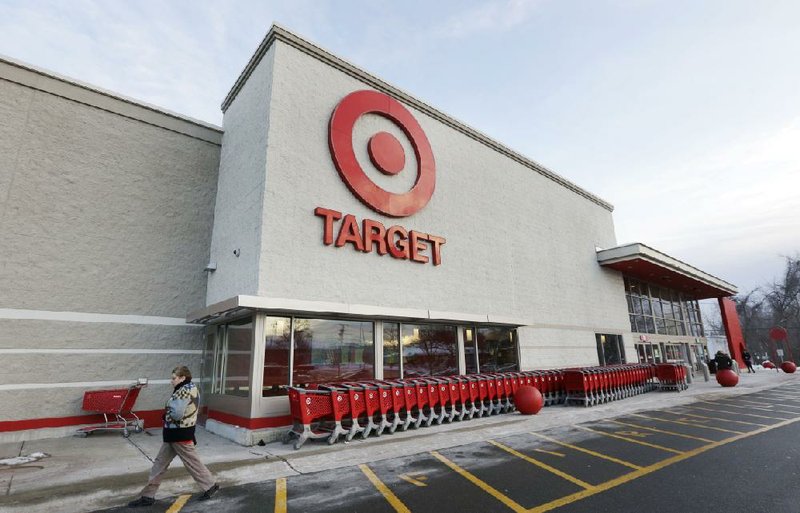 Target Corp. has been working diligently to keep customers visiting its stores like this one in Watertown, Mass., in the wake of hackers stealing card data and personal information from the store late last year, said CEO Gregg Steinhafel. 