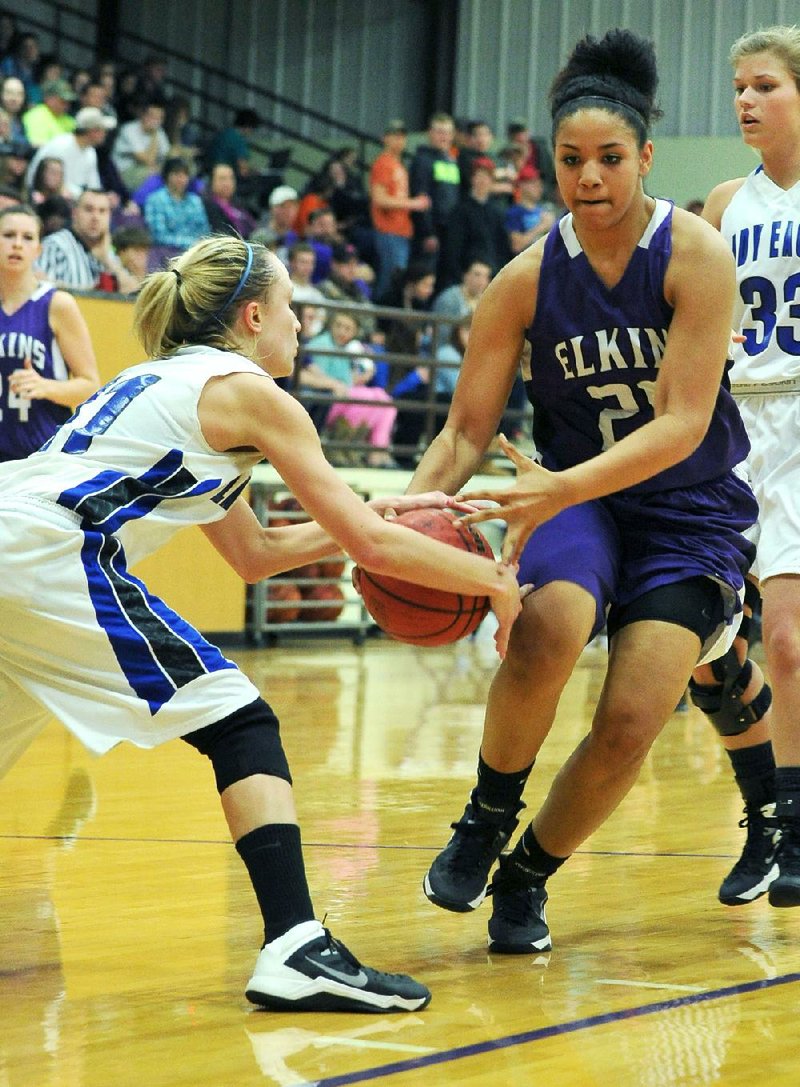 NWA Media/Michael Woods --02/27/2014-- w @NWAMICHAELW...Paris defender Christa Huber steals the ball from Elkins post Skyler Johnson as she tries to drive to the hoop Thursday in the second round of 3A Region 1 basketball Tournament at Elkins High School.