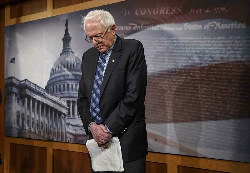 Senate Veterans Affairs Committee Chairman Sen. Bernie Sanders, I-Vt., stands in defeat after a divided Senate derailed Democratic legislation providing $21 billion for medical, education and job-training benefits for the nation's veterans, as the bill fell victim to election-year disputes over spending and whether to slap sanctions on Iran, Thursday, Feb. 27, 2014, on Capitol Hill in Washington. (AP Photo/J. Scott Applewhite)