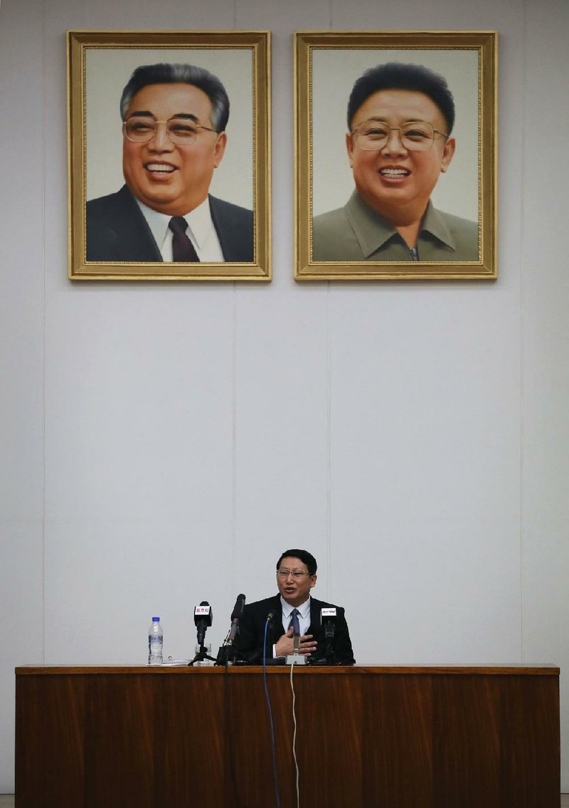 South Korean Baptist missionary Kim Jong-uk apologizes Thursday at a news conference in Pyongyang, North Korea, saying he entered the country to spread the Christian message, which is a state crime. 