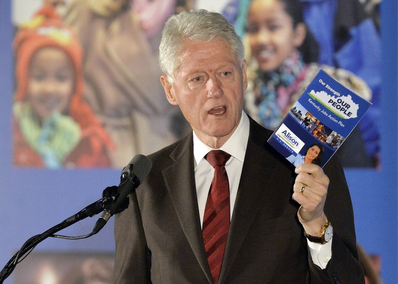 Former President Bill Clinton speaks to a group of supporters during a fundraiser for Democratic Senate challenger Alison Lundergan Grimes on Tuesday, Feb. 25, 2014, in Louisville, Ky. 