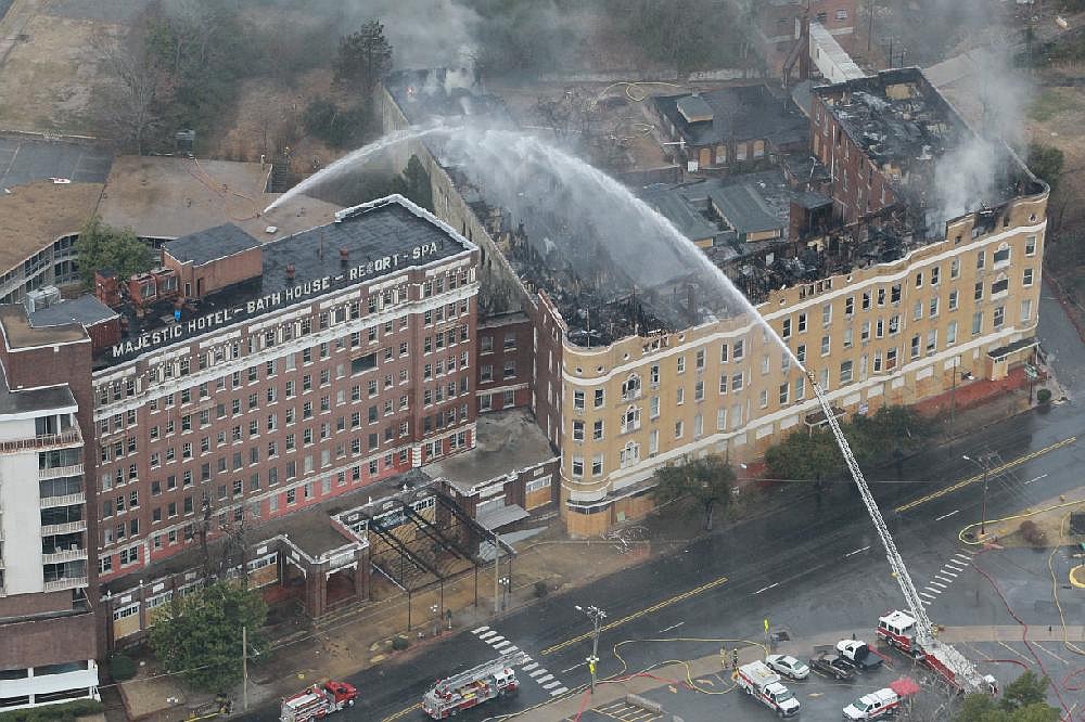 Burned hotel building being razed | Northwest Arkansas Democrat