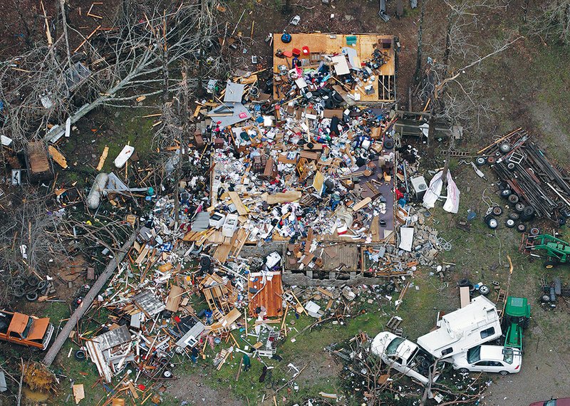 This photo shows what’s left after an April 10, 2013, tornado in Van Buren County hit the home of Carolyn Cloud-Diles and her husband, A.C., on Watergate Road in Botkinburg. They were home at the time, and Cloud-Diles was injured. She said a double billboard blew into their yard, as well as metal from a barn miles away and other debris. Some of the couple’s family photos were found 10 miles away and returned, she said.