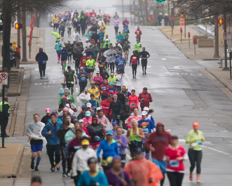 Special to the Arkansas Democrat Gazette/CHRIS BRASHERS - 03/02/2014 - A crowd of runners compete at the 2014 Little Rock Marathon in Little Rock, March 2, 2014