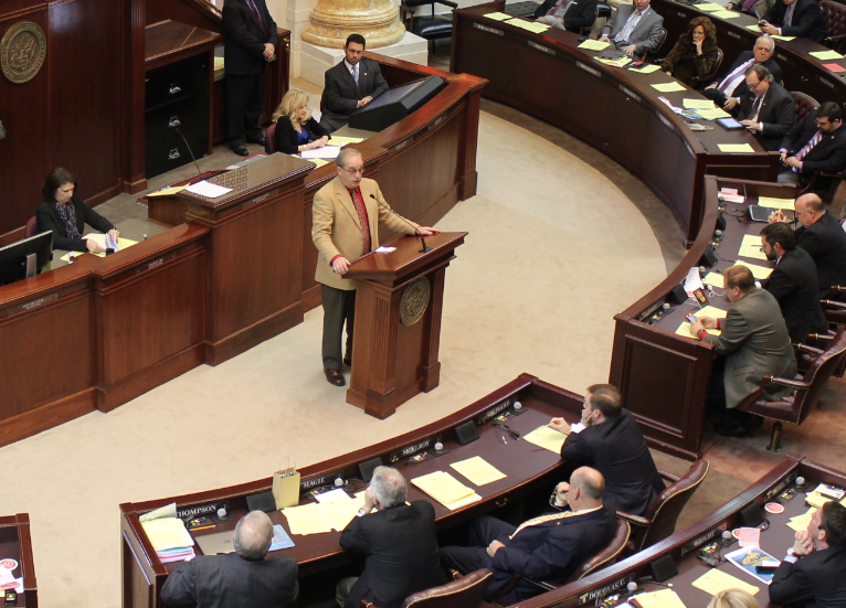 Rep. Kim Hammer, R-Benton, speaks to the state House of Representatives Tuesday before a vote on the private option.