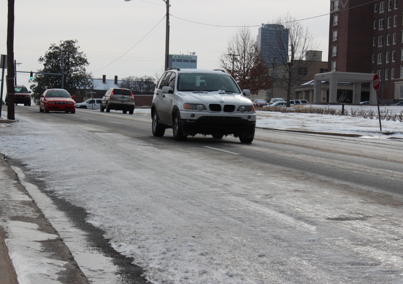 Traffic moves along an icy Third Street in Little Rock Tuesday morning.