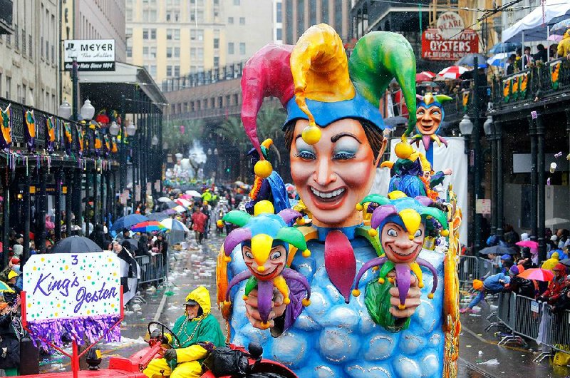 The King’s Jester float makes its way toward the Canal Street turn during Mardi Gras parade Tuesday in New Orleans. 