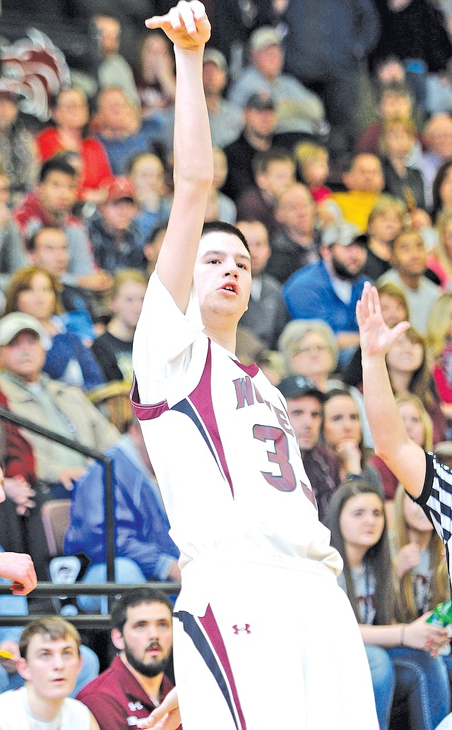 FILE PHOTO Shandon Goldman reacts after making a 3-pointer during the 4A-North Regional Tournament at Lincoln. Goodman, a junior, made eight 3-pointers and scored 26 points against Subiaco Academy.