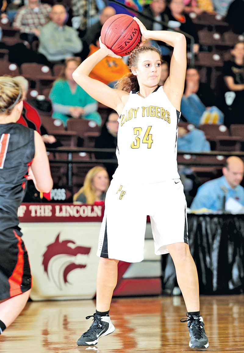 STAFF PHOTO JASON IVESTER Prairie Grove senior Callie Robinson looks for a pass option against Waldron during the second half on Feb. 26 during the 4A Regional tournament at Lincoln High School.