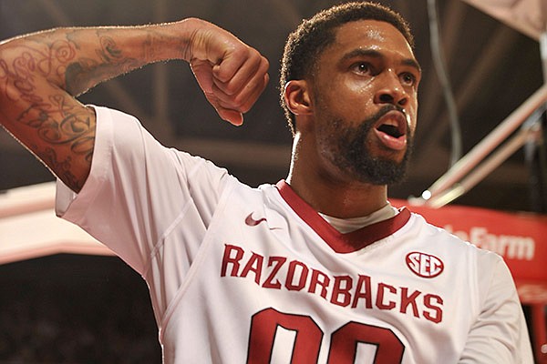 Arkansas guard Ky Madden celebrates after scoring a basket in the second half of Wednesday night's game against Ole Miss at Bud Walton Arena in Fayetteville.
