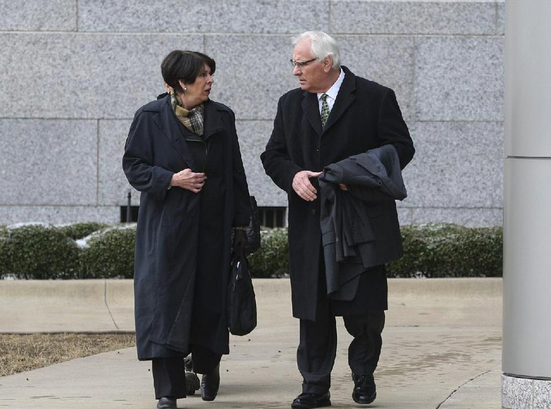 Former Arkansas Treasurer Martha Shoffner arrives Wednesday at the federal courthouse in Little Rock with her attorney, Chuck Banks, for the first day of her extortion and bribery trial. 