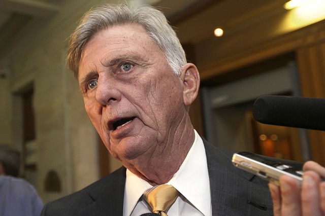 Arkansas Gov. Mike Beebe signed into law a measure that continues funding for the state's private-option Medicaid plan until June 2015.

