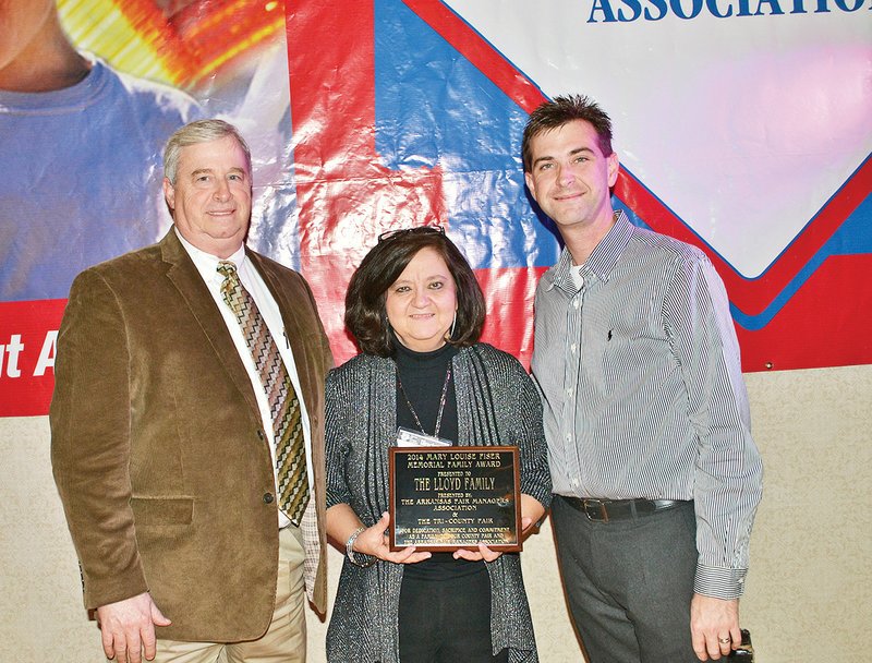 From the left, Phillip, Pam and Matt Lloyd of Batesville received the Mary Louise Fiser Memorial Award at the Arkansas Fair Managers Association’s annual banquet in Hot Springs on Jan. 18. The annual award recognizes a family who has dedicated time working with their local fair.