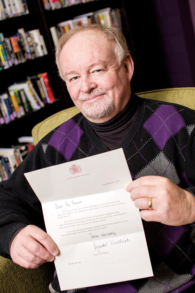 Jimmy Bryant, director of the University of Central Arkansas Archives, holds a letter from Queen Elizabeth II’s lady-in-waiting, who wrote on behalf of the queen in response to a letter Bryant sent. He wrote the queen to tell her that his father appreciated her service during World War II. He said the queen was in the Auxiliary Territorial Service.