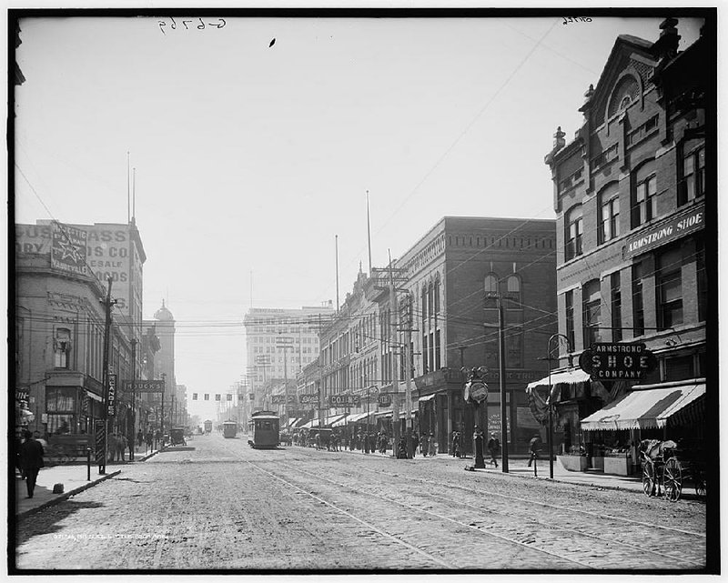 The intersection of Main at Third streets in about 1910. The second floor of the building on the left burned years ago and will be replaced in the restoration. The second building on the right, the Fulk Building, will become home of Cranford Johnson Robinson Woods. 
