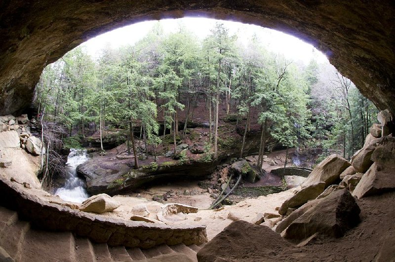 Old Man’s Cave is the most popular area of Hocking Hills State Park. It was named after a hermit, Richard Rowe, who lived in a large recess of the cave with his two dogs around 1800. He is buried beneath the ledge of the large recess. 