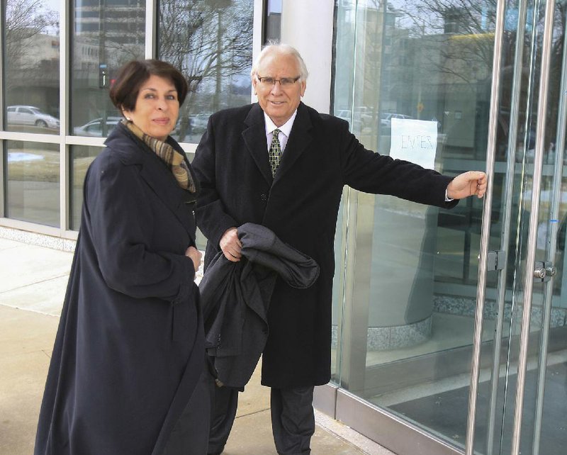 Former state Treasurer Martha Shoffner) arrives Wednesday at the federal courthouse in Little Rock with her attorney, Chuck Banks. Shoffner is charged with six counts of extortion, one count of attempted extortion and seven counts of accepting a bribe as an agent of state government. 