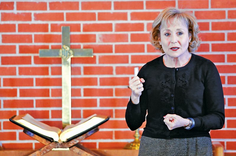 STAFF PHOTO DAVID GOTTSCHALK Abby Foster delivers a devotional Wednesday in the Martin Chapel at Mount Sequoyah Retreat and Conference Center in Fayetteville. Mount Sequoyah Assembly is opening the chapel for private prayer and a devotional each Wednesday during Lent. Martin Chapel will be open from 11:30 a.m. to 1 p.m. with the 15-minute devotional beginning at noon. Foster serves as the chief executive officer of the retreat and conference center.