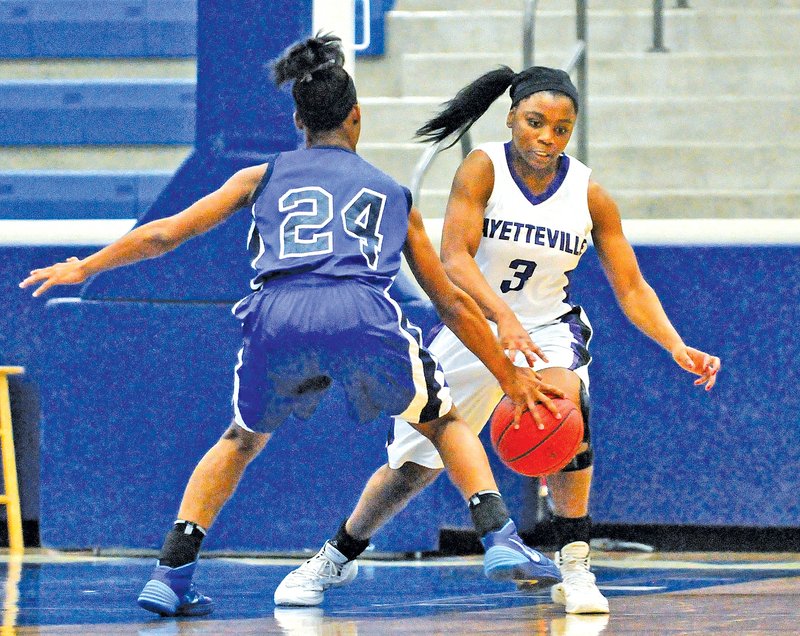  Special To NWA Media Mike Kemp Jaylah Prude of Fayetteville tries to get the ball up the court Saturday under pressure from Conway&#8217;s Jordan Danberry during the second round of the girls&#8217; 7A State Basketball Tournament in Conway.