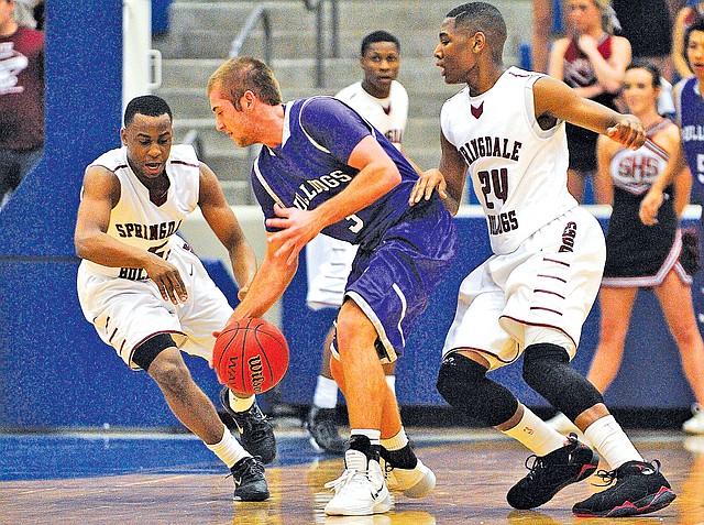  Special To NWA Media Mike Kemp Sprindale guards Tereke Eckwood, left, and Chris Owens put pressure on Fayetteville guard Mason Adams during Saturday&#8217;s game in the 7A State Tournament in Conway.