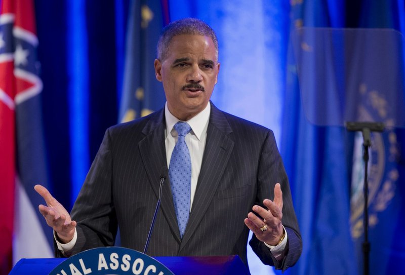 Attorney General Eric Holder speaks at the annual Attorneys General Winter Meeting in Washington on Tuesday, Feb. 25, 2014. 