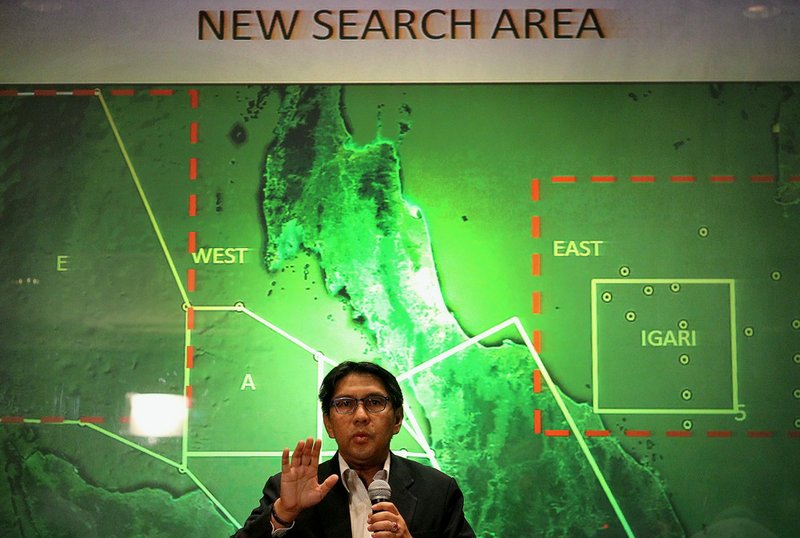 Malaysia's Department of Civil Aviation's Director General Azharuddin Abdul Rahman briefs reporters on search and recovery efforts within existing and new areas for missing Malaysia Airlines plane during a news conference Monday, March 10, 2014 in Sepang, Malaysia. The search operation for the missing Flight MH370 which has involved 34 aircraft and 40 ships from several countries covering a 50-nautical mile radius from the point the plane vanished from radar screens between Malaysia and Vietnam continues after its disappearance since Saturday. 