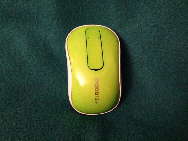 Special to the Democrat-Gazette - 03/07/2014 - Rapoo T120P wireless mouse is small enough for travel and sensitive enough for use on nearly any surface.