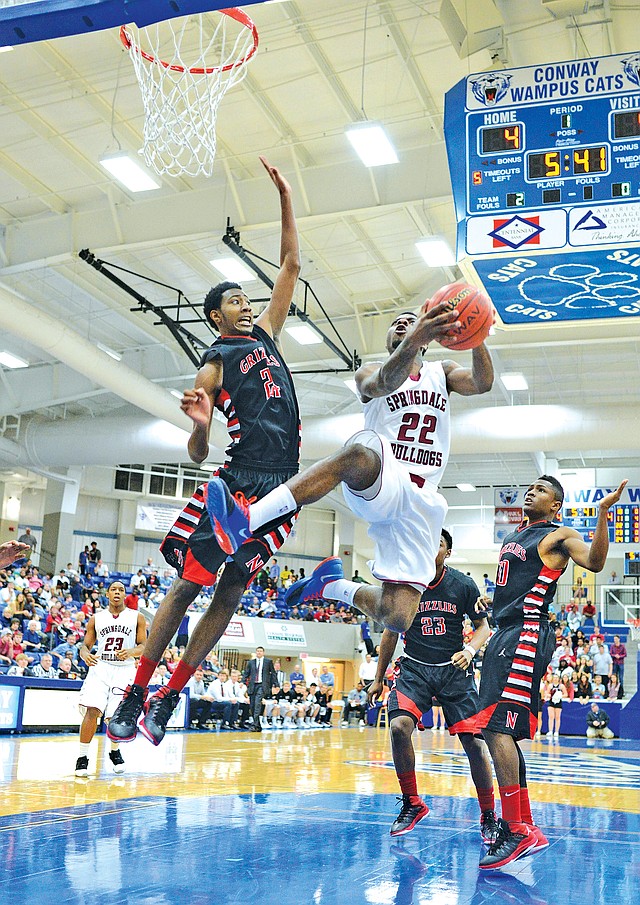 Special to NWA MEDIA Jaison Sterling D.J. Evans of Springdale High soars to the basket Monday against Fort Smith Northside at the Class 7A state tournament in Conway.