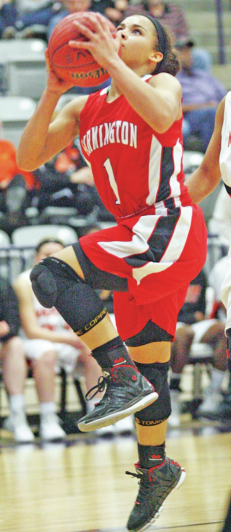 Special to NWA Media Mark Buffalo Tayton Hopkins of Farmington attempts a layup Monday against Malvern in the semifinals of the Class 4A state tournament at the Gina Cox Center in Lonoke.