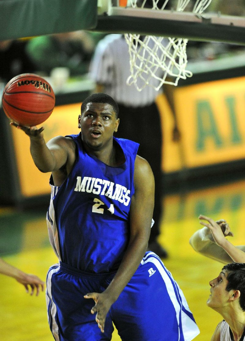 Forrest City’s 6-10 senior center Trey Thompson, an Arkansas signee, finished with 10 points and nine rebounds in the Mustangs’ 65-51 victory over Pulaski Academy on Tuesday afternoon in the semifinals of the Class 5A boys basketball state tournament in Alma. 