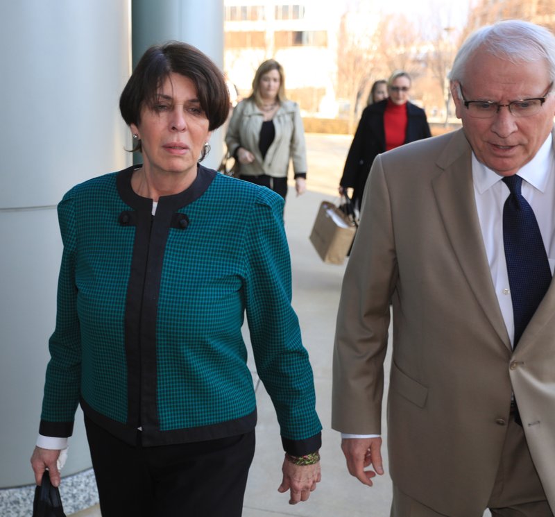 Martha Shoffner, former state Treasurer, leaves with her attorney Charles "Chuck" Banks after she was found guilty in her bribery and extortion trial at the Federal Courthouse in Little Rock Tuesday.