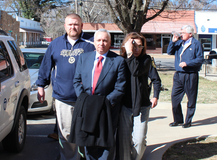 Jack Gillean, center, is escorted by authorities from the Van Buren County courthouse in March 2014 after his sentencing.