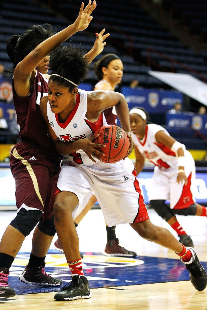 Arkansas State forward Jalen O’Bannon drives to the basket Wednesday in the second half of a 78-69 victory over Louisiana-Monroe in the quarterfinals of the Sun Belt Tournament at Lakefront Arena in New Orleans. O’Bannon had a season-high 21 points to lead the Red Wolves. 