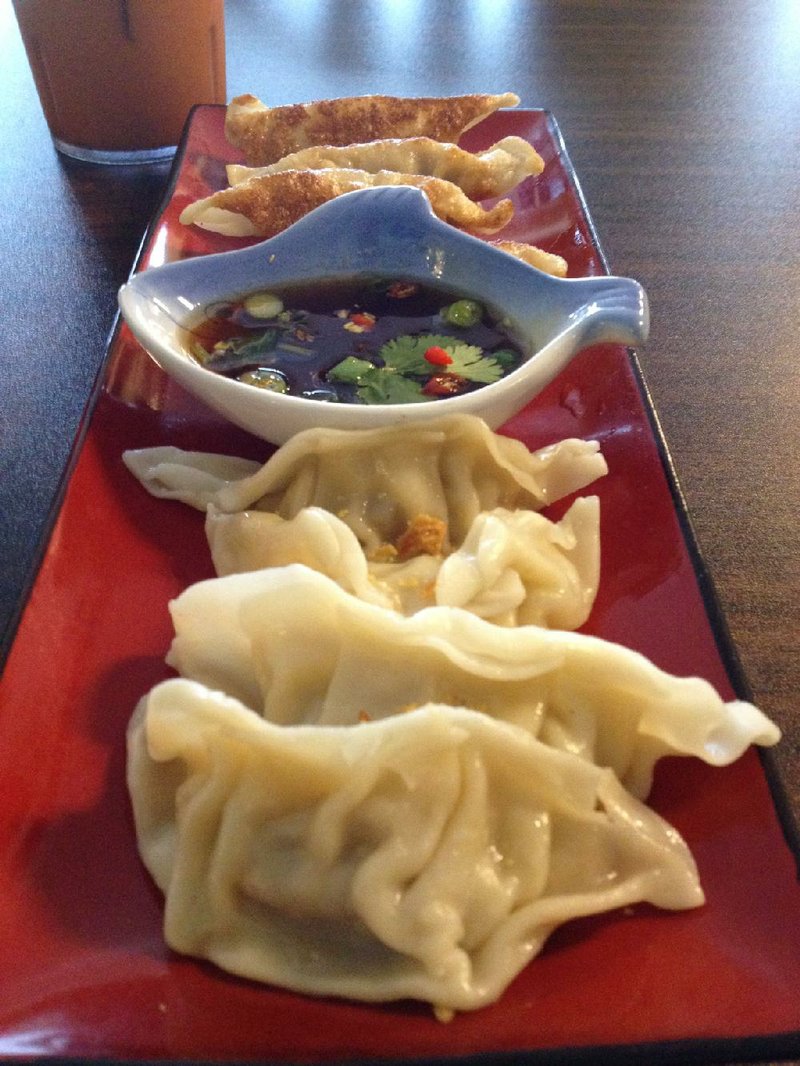 You can get Chang’s Gyoza fried (top) or steamed, with a soy-garlic-hot pepper dipping sauce that deserves caution and respect. 
