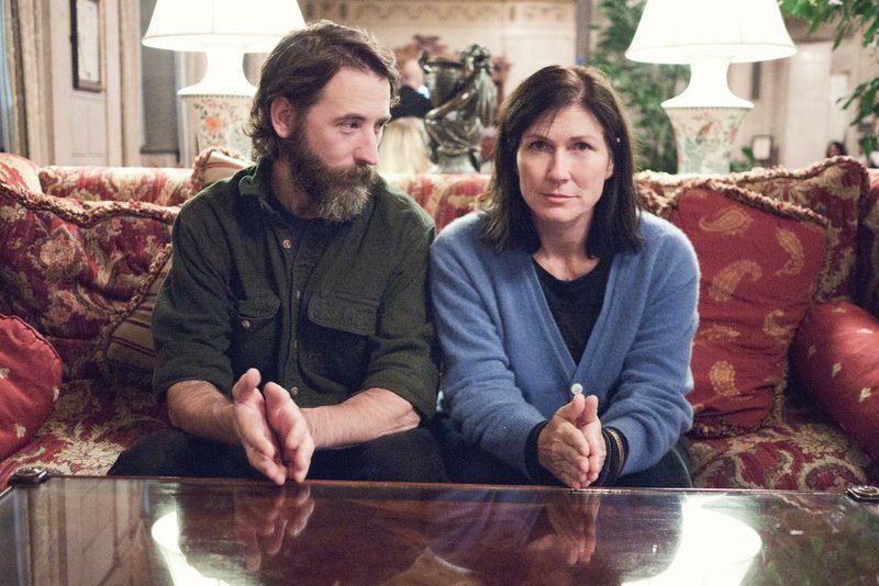 R. Ring is Mike Montgomery (left) and Kelley Deal. 