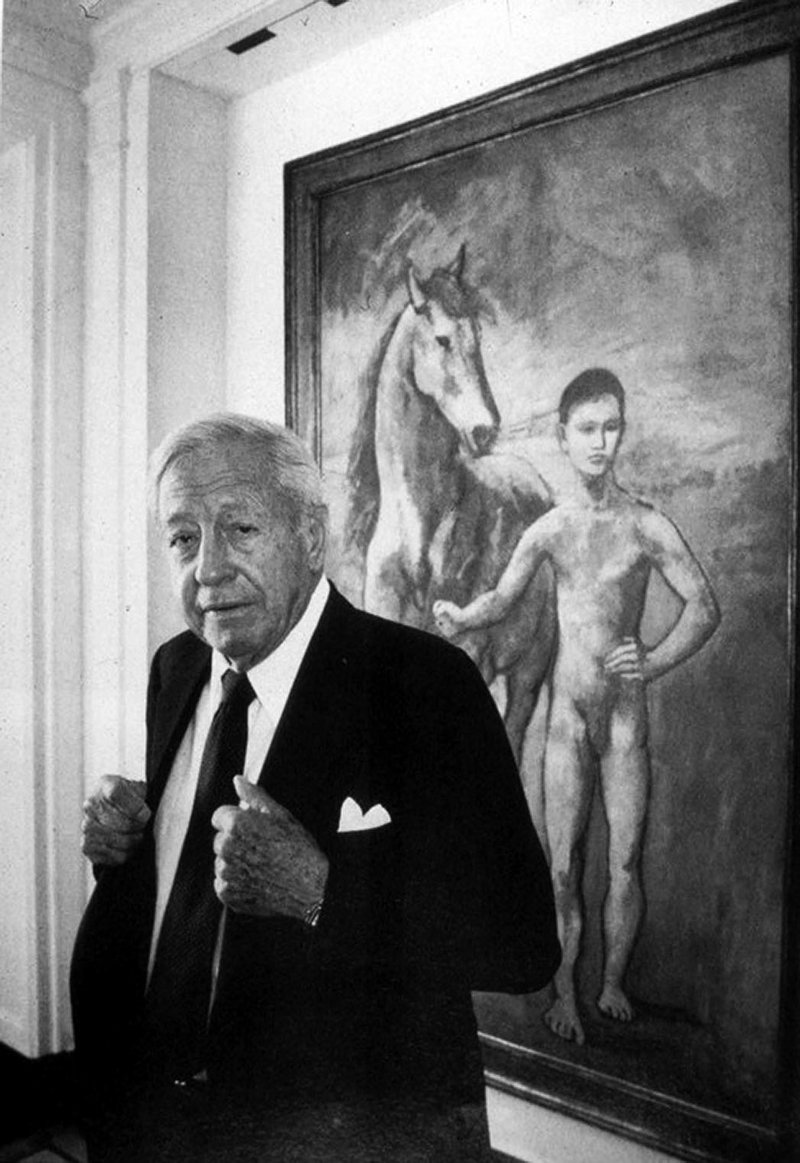 PHOTO COURTESY Crystal Bridges Museum of American Art William S. Paley spent many years as president of the Museum of Modern Art in New York City. The museum now owns many of the works he collected. Here, Paley, who died in 1990, stands in front of a work by Picasso.