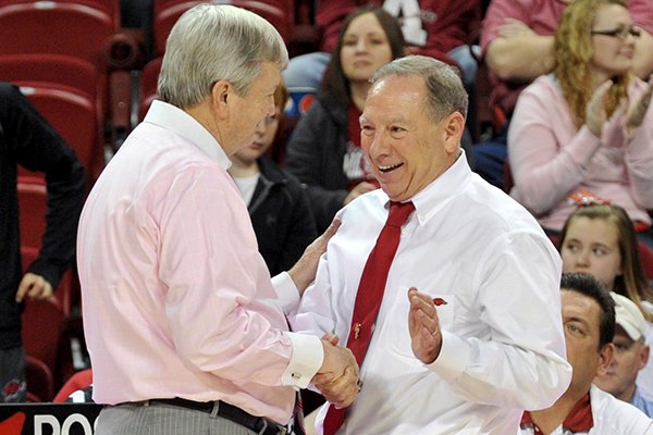 Texas A&M coach Gary Blair (left) and Arkansas coach Tom Collen talk prior to a Jan. 6, 2013 game at Bud Walton Arena in Fayetteville. 