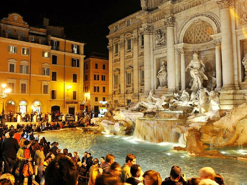 Trevi Fountain is always lively, and at night serves as a major gathering spot for teens on the make and tourists tossing coins. 
