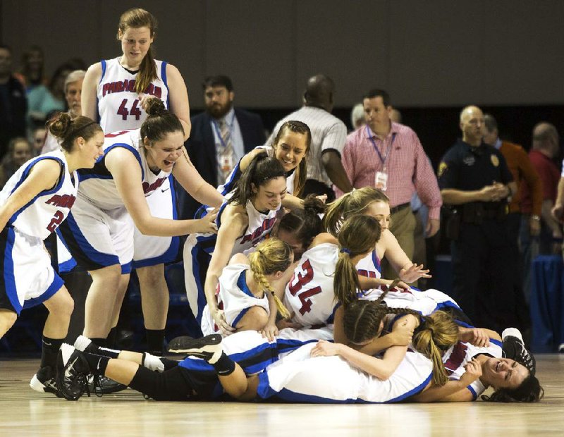 
ARKANSAS DEMOCRAT GAZETTE/MELISSA SUE GERRITS 03/15/2014 -Paragould player celebrate at the bell after their win against Huntsville in the 5A Championship Game March 15, 2014 in Hot Springs. 