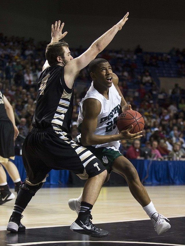 
ARKANSAS DEMOCRAT GAZETTE/MELISSA SUE GERRITS 03/14/2014 -Episcopal's Justin Gooseberry eyes the basket while Charleston's Ty Storey reaches to block his shot during their 3A championship game March 15, 2014 in Hot Springs. 